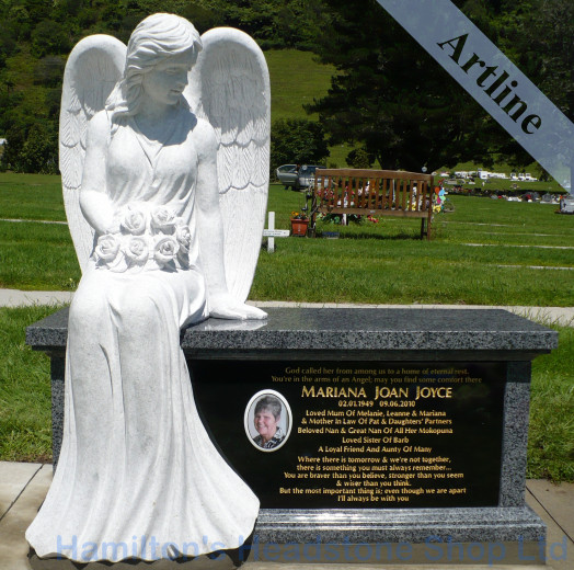 Seated Angel and Bench Headstone
